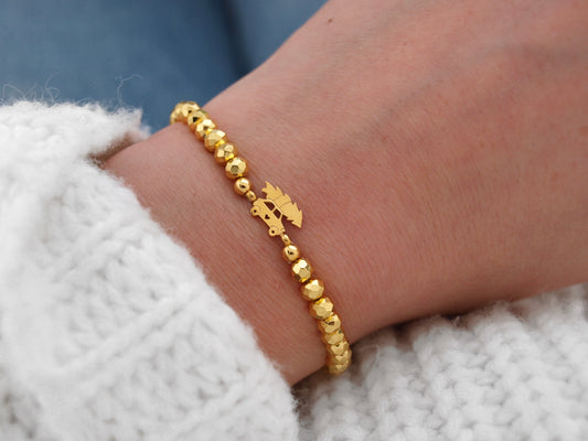 Perlenarmband Weihnachtsauto gold