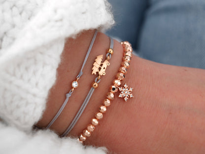 Perlenarmband Schneeflocke