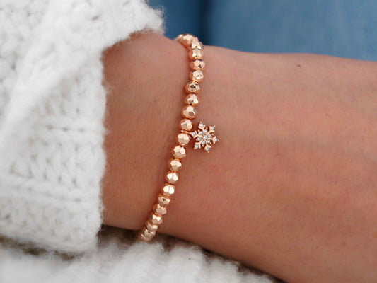 Perlenarmband Schneeflocke