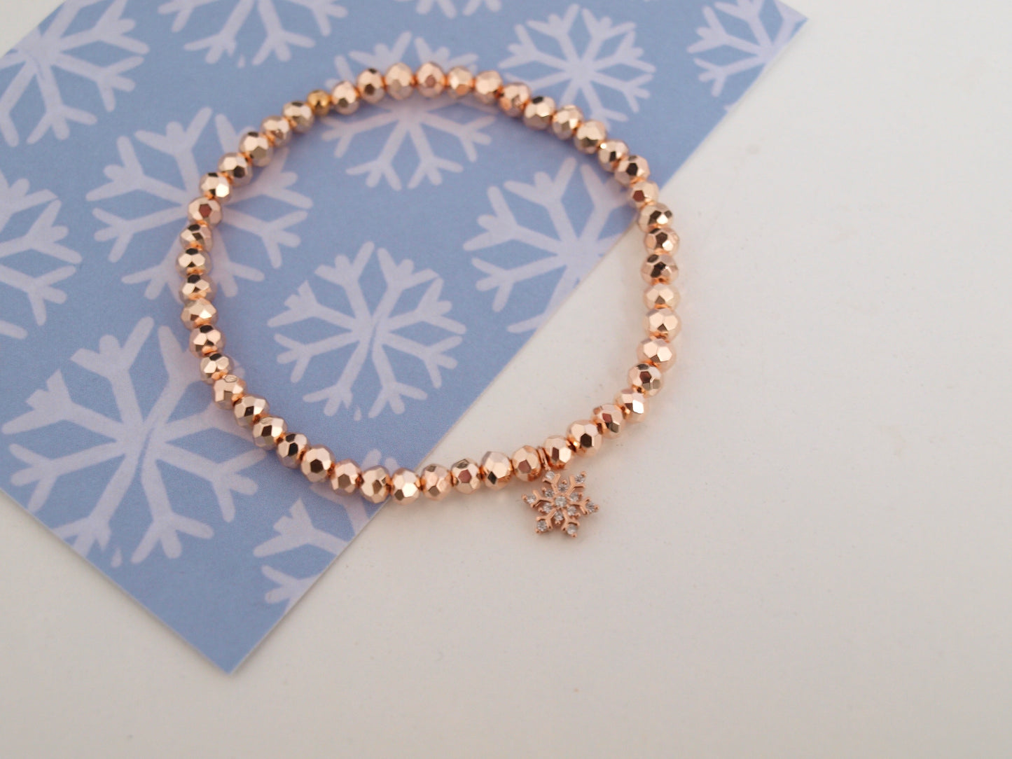 Perlenarmband Schneeflocke