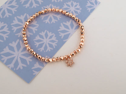 Perlenarmband Schneeflocke